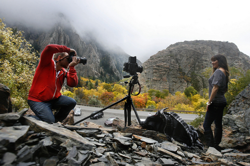 Scott Sommerdorf   |  The Salt Lake Tribune
Cody Moore photographs Ashley Nelson at Storm Mountain, Sunday, October 12, 2013.