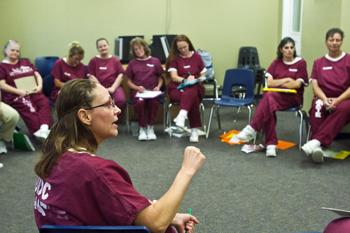 Chris Detrick  |  The Salt Lake Tribune

Tangie Anderson participates in a Getting Out by Going In (GOGI) class at the Timpanogos women's facility at Utah State Prison Tuesday August 6, 2013. GOGI is a non-profit organization that helps at-risk and incarcerated individuals make better choices by changing unhealthy patterns of thought and behavior.
