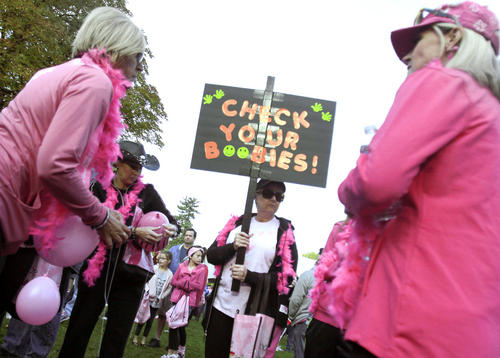 Keith Johnson | The Salt Lake Tribune
 
Jill Parsons (center) and the other members of her team "Breast Friends Forever" join hundreds of others for the Making Strides Against Breast Cancer walk at Liberty Park in Salt Lake City, October 12, 2013.