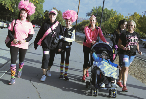 Keith Johnson | The Salt Lake Tribune
 
(l to r) Markell Thomas (14), JoAnn Herbert, Dalls Potter (12) and Kelli Thomas and Shelli James participate in the Making Strides Against Breast Cancer walk at Liberty Park in Salt Lake City, October 12, 2013.