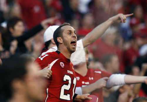 Scott Sommerdorf   |  The Salt Lake Tribune
A Utah fan in the north end zone gets enthusiastic with the Utes on defense. Utah upset #5 Stanford 27-21, Saturday, October 12, 2013.