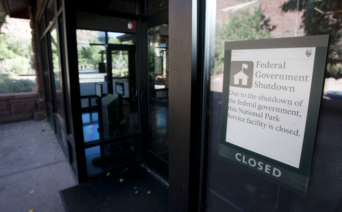 Steve Griffin  |  The Salt Lake Tribune
Signs inform campers that the visitors center at in Zion National Park is closed due to the federal government shutdown Tuesday.