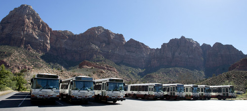 Steve Griffin  |  The Salt Lake Tribune

Shuttle buses are parked in a lot at Zion National Park following the federal government shutdown Tuesday, October 1, 2013.