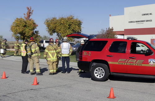 Al Hartmann  |  The Salt Lake Tribune
The Salt Lake City Fire Department responds to a 10-gallon chemical spill at RinChem, 5171 W. 150 South, west of Salt Lake City on Wednesday Oct. 16, 2013.  Six employees were evacuated from the building.