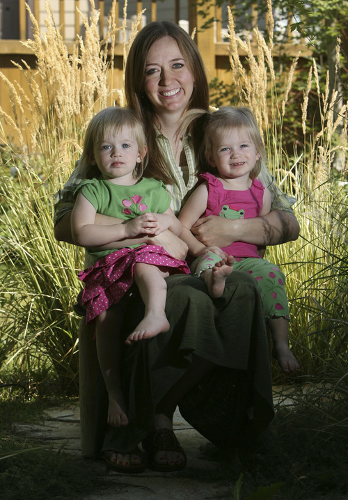 Steve Griffin | The Salt Lake Tribune
.

Shannon Hale, one of the leaders of Utah's young-adult literature scene, is pictured with her twins Dinah and Wren in their South Jordan home in 2012.