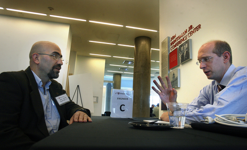 Scott Sommerdorf   |  The Salt Lake Tribune
John Cinbis, left, of Madtronic Inc., speaks with Florian Solzbacher, director of the Center for Engineering Innovation, during a "speed dating" conversation at the James L. Sorenson Molecular Biotechnology Building on the University of Utah campus, Thursday, October 17, 2013. The kickoff celebration was meant to demonstrate how the center transforms inventions into ready-to-produce devices. The speed dating part of the event enabled inventors and companies with new product ideas to meet engineers for 15 minutes to explore bringing concepts to market.