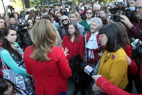 Rick Egan  | The Salt Lake Tribune 

Ruth Todd, LDS spokesperson, talks to the group Ordain Women, speaks to the group onTemple Square as they attempted to stand in the standby line to try to gain admittance to the Priesthood session of the 183rd Semi-annual General Conference, Saturday, October 5, 2013.