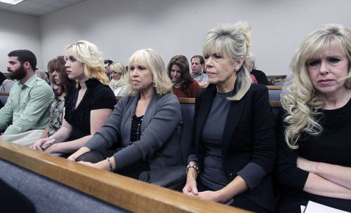 Al Hartmann  |  The Salt Lake Tribune
Family members of Michele McNeill listen to testimony in Judge Derek Pullan's 4th District Court in Provo Thursday October 17 during the murder trial of Pleasant Grove physician Martin MacNeill. Martin McNeill is charged with murder and obstruction for allegedly killing his wife, Michele MacNeill in 2007 so he could continue an extra-marital affair.