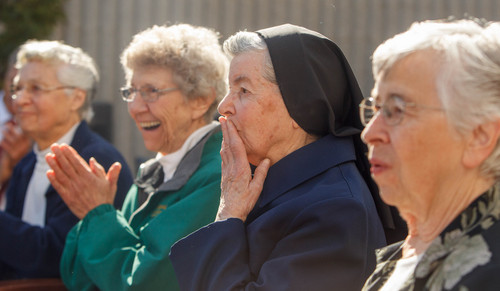 Trent Nelson  |  The Salt Lake Tribune
Sisters Danile Knight, Stephanie Mongeon, Luke Hoschette and Mary Zenzen react as a monument honoring the Sisters of St. Benedict and their legacy at Ogden Regional Medical Center is unveiled at the center in Ogden, Thursday October 17, 2013.