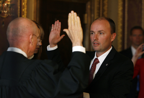 Scott Sommerdorf   |  The Salt Lake Tribune
Rep. Spencer Cox is sworn in as Utah's new lieutenant governor in the Gold Room of the Utah State Capitol building, Wednesday, October 16, 2013.