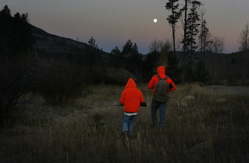 Scott Sommerdorf   |  The Salt Lake Tribune
Twelve year old Grayden Larson and his father Aaron of Bluffdale head out on their first hunting trip together as they hunt near Soapstone Basin just off the Mirror Lake Highway, early Saturday morning.