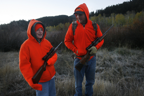 Scott Sommerdorf   |  The Salt Lake Tribune
Twelve year old Grayden Larson and his father Aaron of Bluffdale on their first hunting trip together as they hunt near Soapstone Basin just off the Mirror Lake Highway, early Saturday morning.