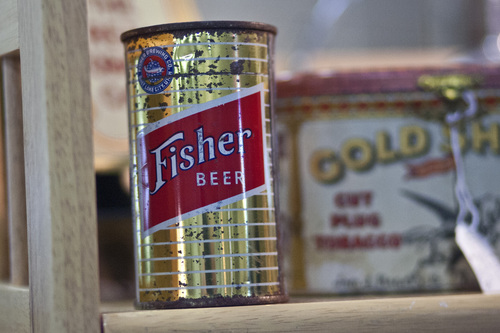 Chris Detrick  |  The Salt Lake Tribune
An antique Fisher beer can for sale during the Original Salt Lake Antique Show at the South Towne Exposition Center Saturday October 19, 2013. Dealers from around the country will be selling pottery, heirloom jewelry, textiles, fine art, country store antiques, Native American art and more. The show continues Sunday from noon to 5 p.m.