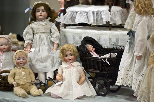 Chris Detrick  |  The Salt Lake Tribune
Antique dolls for sale during the Original Salt Lake Antique Show at the South Towne Exposition Center Saturday October 19, 2013. Dealers from around the country will be selling pottery, heirloom jewelry, textiles, fine art, country store antiques, Native American art and more. The show continues Sunday from noon to 5 p.m.