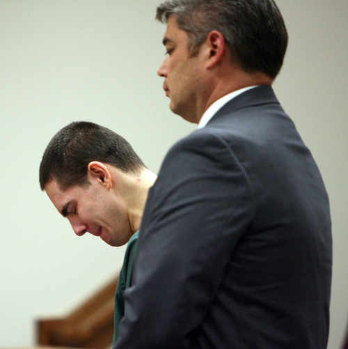Steve Griffin  |  The Salt Lake Tribune

Standing with his attorney Dusty Kawai, Joshua Petersen, left, weeps and lowers his head after receiving a sentence of life in prison without the chance of parole in Judge Darold McDade's courtroom in the Fourth District Court in Provo, Utah Monday, October 21, 2013. Petersen plead guilty, last month, to aggravated murder for the April 5 shooting death of his 5-month-old son, Ryker Petersen.