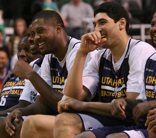 Leah Hogsten | The Salt Lake Tribune
Utah Jazz forward Derrick Favors and center Enes Kanter laugh at the dance moves of Trey Burke. Utah Jazz fans filled  EnergySolutions Arena to get a glimpse at this year's players during the annual scrimmage Saturday, October 5, 2013. The Jazz roster currently includes 20 players, but NBA rules require that that number must be reduced to 15 by opening night, Oct. 30 against Oklahoma City.