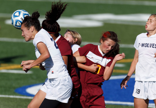 Trent Nelson  |  The Salt Lake Tribune
Timpanogos's Jordyn Chung-Hoon heads the ball, as Mountain View faces Timpanogos High School in a 4A girls state soccer semifinal match, Tuesday October 22, 2013.