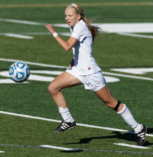 Trent Nelson  |  The Salt Lake Tribune
Timpanogos's Devri Hartle drives the ball as Mountain View faces Timpanogos High School in a 4A girls state soccer semifinal match, Tuesday October 22, 2013.
