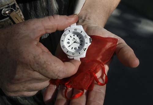 Scott Sommerdorf   |  The Salt Lake Tribune
Tracie Lindley holds the watch that her son Zachery was wearing at the time he was hit by an auto while skateboarding to his girlfriend's house. The watch stopped at 3:19, the time of the accident. Lindley keeps the watch with her in her purse inside a small red bag. The Utah Department of Health and UDOT held a press conference, Wednesday, October 23, 2013, to share stories of families who lost a child in a motor vehicle crash in 2012.