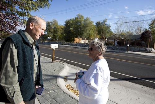 Lennie Mahler  |  The Salt Lake Tribune
West Valley City mayoral candidate Ron Bigelow speaks with resident Shirlene Casaday as she takes a morning walk Thursday, Oct. 17, 2013.