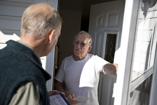 Lennie Mahler  |  The Salt Lake Tribune
West Valley City mayoral candidate Ron Bigelow speaks with resident Julian Ferguson at his home in West Valley City on Thursday, Oct. 17, 2013. Bigelow canvassed the neighborhood door-to-door to connect with voters.