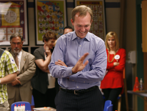 Scott Sommerdorf   |  The Salt Lake Tribune
Salt Lake County Mayor Ben McAdams, in blue, waves to children in a preschool class at Wright Elementary Schoo in West Valley City. The county mayor, Republican and Democratic councilmen, and school district officials visited the classroom, which included kids who might not have gotten into the preschool program without assistance from a private/public partnership program.