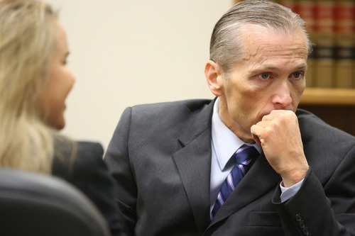 Francisco Kjolseth  |  The Salt Lake Tribune
Pleasant Grove physician Martin MacNeill, charged with murder for allegedly killing his wife, Michele MacNeill in 2007 so he could continue and extra-marital affair, sits next to his attorney Susanne Gustin in Judge Derek Pullan's 4th District Court in Provo on Friday, Oct. 25, 2013.