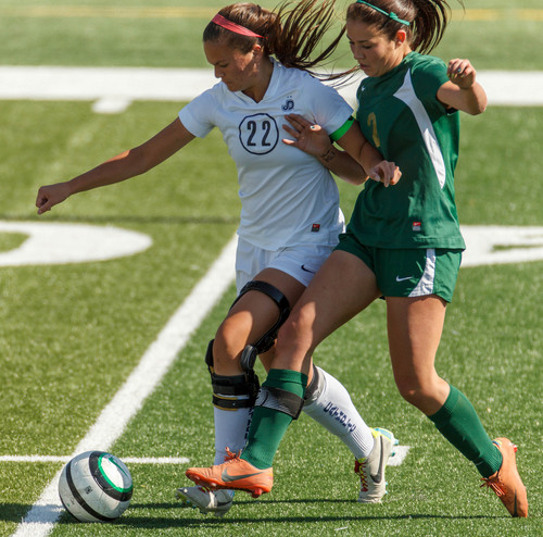 Trent Nelson  |  The Salt Lake Tribune
Juan Diego's Presley Azarcon and Snow Canyon's Lauren Smith fight for the ball. Juan Diego High School hosts Snow Canyon in a 3A girls' soccer state quarterfinal match in Draper, Saturday October 19, 2013.