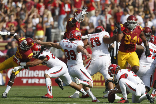 Chris Detrick  |  The Salt Lake Tribune
Utah Utes kicker Andy Phillips (39) kicks a field goal during the first half game at the The Los Angeles Memorial Coliseum Saturday October 26, 2013. USC is winning the game 16-3.