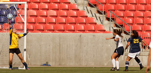 Trent Nelson  |  The Salt Lake Tribune
Summit's Juliana Stratford scores a goal on Waterford goalkeeper Lauren Groathouse as Waterford faces Summit Academy in the 2A high school girls' soccer state championship game at Rio Tinto Stadium in Sandy, Saturday October 26, 2013.