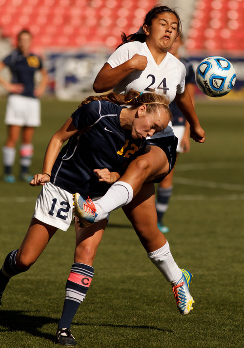 Trent Nelson  |  The Salt Lake Tribune
Summit's Allison Gorringe and Waterford's 24 collide as Waterford faces Summit Academy in the 2A high school girls' soccer state championship game at Rio Tinto Stadium in Sandy, Saturday October 26, 2013.