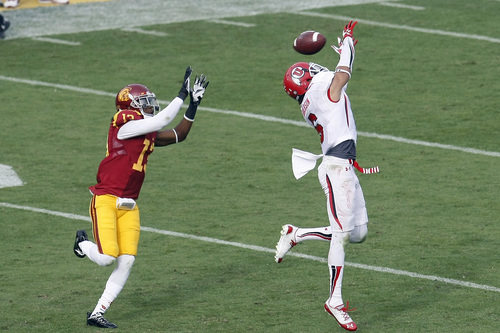 Chris Detrick  |  The Salt Lake Tribune
Utah Utes wide receiver Dres Anderson (6) can't make a catch while being covered by USC Trojans cornerback Kevon Seymour (13) during the second half game at the The Los Angeles Memorial Coliseum Saturday October 26, 2013. USC won the game 19-3.