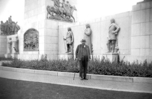 Photo Courtesy Utah State Historical Society

Mahonri Macintosh Young (1877 – 1957) was an American sculptor and artist. Young is the sculptor of the This Is The Place monument and the Seagull Monument in Salt Lake City. He is also the grandson of Brigham Young. Mahonri Young was especially proud of This Is The Place Monument found in the foothills of Salt Lake City. He was awarded commission to build the monument in 1939 when he was 62. However, the project proved frustrating. LDS Church, and descendants of pioneers wouldn't let Mahonri depict pioneer leaders in realistic clothing like they would have worn when entering the Salt Lake Valley on July 24, 1847. Brigham Young in suspenders and bloomers was deemed undignified. Instead, pioneer leaders were portrayed in heavy formal overcoats.