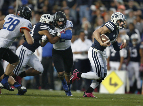 Scott Sommerdorf   |  The Salt Lake Tribune
BYU QB Taysom Hill runs for a 20 yard TD to gibe BYU and 7-0 lead. BYU held a 24-3 lead over Boise State, Friday, October 25, 2013