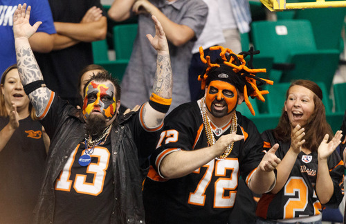 Trent Nelson  |  The Salt Lake Tribune
Blaze fans celebrate an early score as the Utah Blaze face the Cleveland Gladiators, AFL football at EnergySolutions Arena in Salt Lake City, Saturday July 27, 2013.