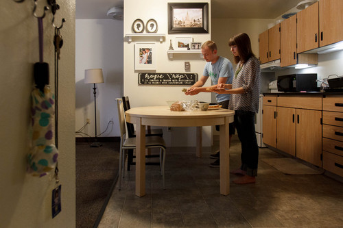 Trent Nelson  |  The Salt Lake Tribune
Jonathan and Courtney Hope prepare dinner in their Provo apartment Wednesday, September 11, 2013. The couple are weighing their health insurance options including how the Affordable Care Act will affect them.