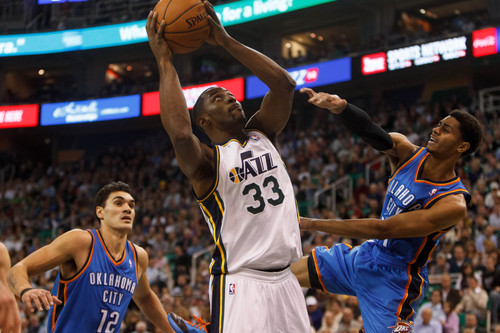 Trent Nelson  |  The Salt Lake Tribune
Utah Jazz forward Mike Harris (33) shoots the ball, defended by Oklahoma City Thunder guard Jeremy Lamb (11), as the Utah Jazz host the Oklahoma City Thunder, NBA Basketball at EnergySolutions Arena in Salt Lake City, Wednesday October 30, 2013.