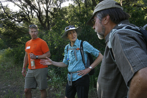 Scott Sommerdorf  |  The Salt Lake Tribune
Secretary of Interior Sally Jewell speaks with Brad Washa, left, and Mike Nelson as she hikes to Barney's Peak in the Oquirrhs with BLM employees, Saturday, June 29, 2013.