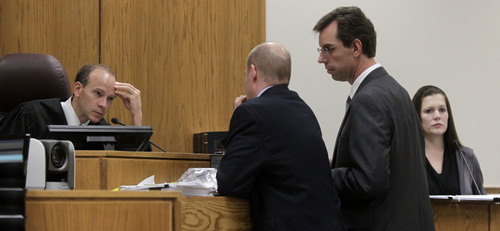 Al Hartmann  |  The Salt Lake Tribune
Judge Derek Pullan, left, speaks to prosecuter Chad Grunander and defense lawyer Randy Spencer during a break in testimony of Alexis Somers, right at the Martin MacNeill murder trial in Provo, Utah, Thursday, Oct. 31, 2013