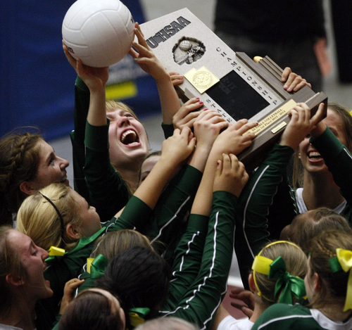 Chris Detrick  |  The Salt Lake Tribune
Members of the St. Joseph volleyball team celebrate after winning the 1A volleyball championships against Piute at UCCU Center at Utah Valley University Thursday October 31, 2013.