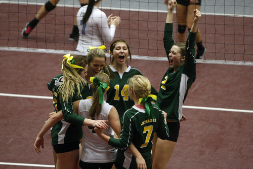 Chris Detrick  |  The Salt Lake Tribune
Members of the St. Joseph volleyball team celebrate after winning a point in the 1A volleyball championships against Piute at UCCU Center at Utah Valley University Thursday October 31, 2013.