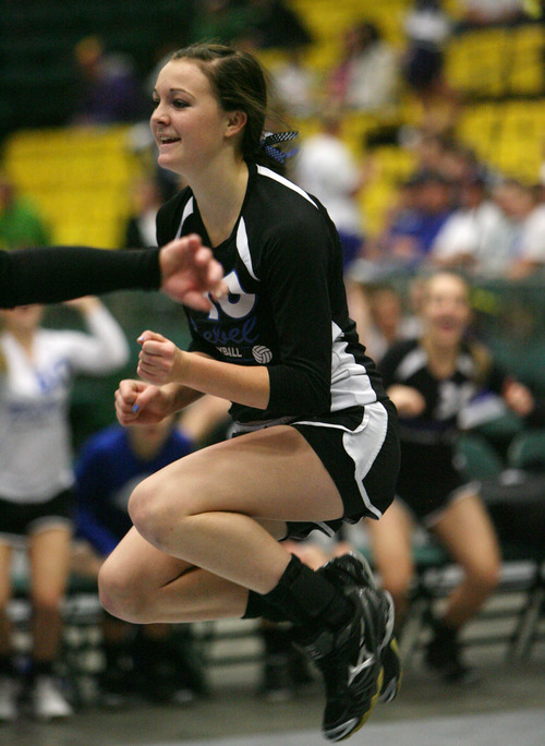 Steve Griffin  |  The Salt Lake Tribune


Ellen Peart, of Rich, leaps into the air after serving a winner during quarterfinal volleyball match against Milford at Utah Valley University's UCCU Center in Provo in Provo, Utah Wednesday, October 30, 2013.