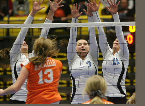 Steve Griffin  |  The Salt Lake Tribune


The Piute team up to try and block a spike from Monticello's Ashley Ewart during quarterfinal match at Utah Valley University's UCCU Center in Provo in Provo, Utah Wednesday, October 30, 2013.