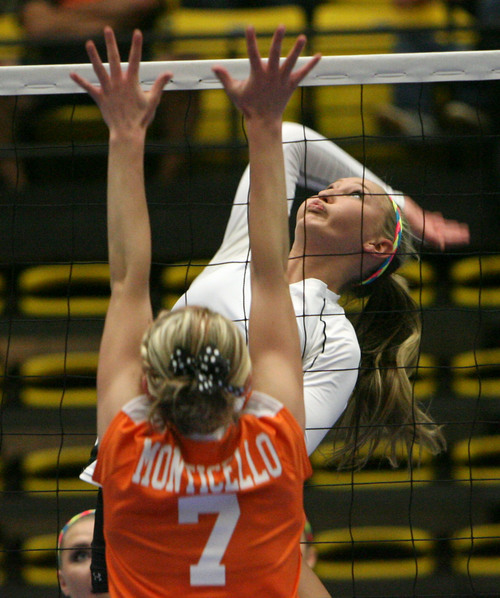 Steve Griffin  |  The Salt Lake Tribune


 Piute's Shaylee Gleave looks to spike the ball over Monticello's Averi Christiansen during quarterfinal match at Utah Valley University's UCCU Center in Provo in Provo, Utah Wednesday, October 30, 2013.