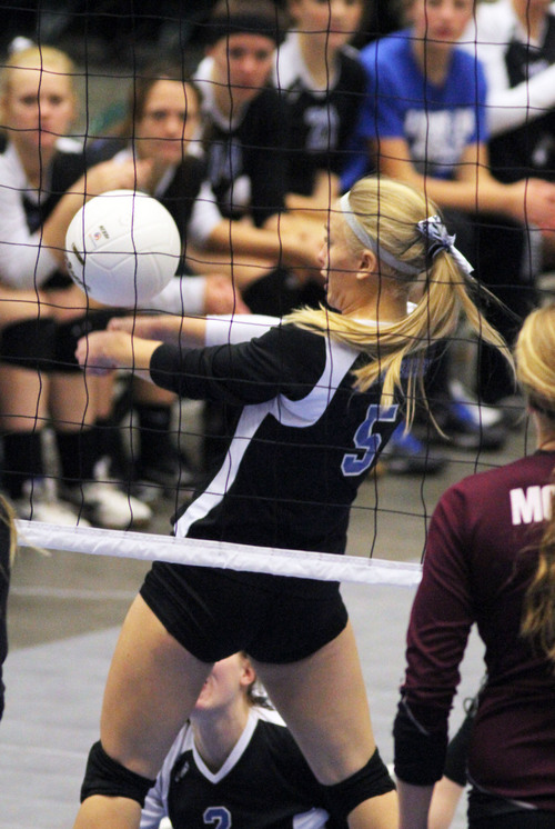 Francisco Kjolseth  |  The Salt Lake Tribune
Madison Barnes of Stansbury returns a shot against Morgan in the 3A state quarterfinal volleyball matches at Utah Valley University UCCU Center on Friday, Nov. 1, 2013. Morgan went on to win 25-9, 25-16, 25-11.