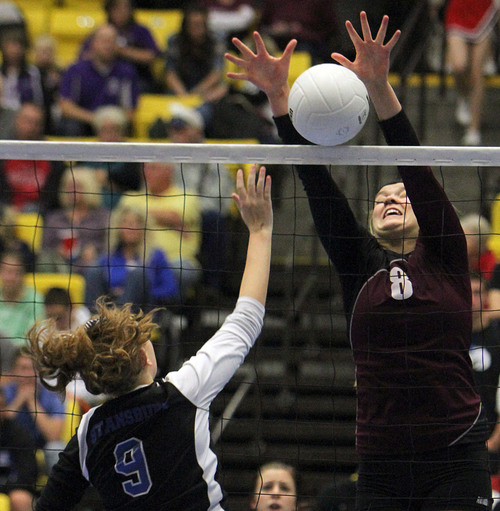Francisco Kjolseth  |  The Salt Lake Tribune
TylerAnn Conner of Stansbury is blocked by Aubrey Sanders of Morgan in the 3A state quarterfinal volleyball matches at Utah Valley University UCCU Center on Friday, Nov. 1, 2013. Morgan went on to win 25-9, 25-16, 25-11.