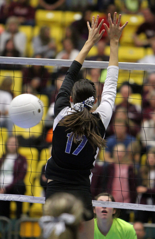 Francisco Kjolseth  |  The Salt Lake Tribune
Tiffany Robbins of Stansbury lets one through while competing against Morgan in the 3A state quarterfinal volleyball matches at Utah Valley University UCCU Center on Friday, Nov. 1, 2013. Morgan went on to win 25-9, 25-16, 25-11.