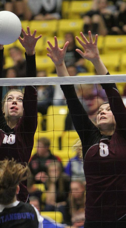 Francisco Kjolseth  |  The Salt Lake Tribune
Casey Thompson, left, and Aubrey Saundersof Morgan block a shot from Stansbury in the 3A state quarterfinal volleyball matches at Utah Valley University UCCU Center on Friday, Nov. 1, 2013.