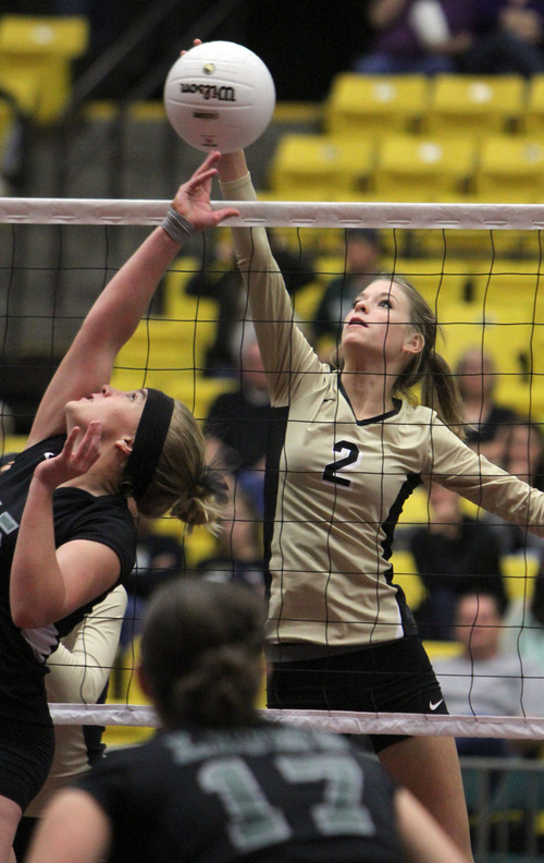 Francisco Kjolseth  |  The Salt Lake Tribune
Rachel Winters of Desert Hills goes up for a shot against Payson in the 3A state quarterfinal volleyball matches at Utah Valley University UCCU Center on Friday, Nov. 1, 2013.