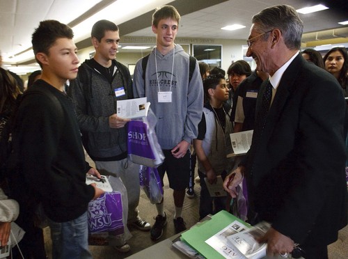 Leah Hogsten  |  The Salt Lake Tribune
Third District Court juvenile Judge Andrew Valdez autographs his book "No One Makes It Alone," for Utah high school students. Valdez talked about his  mentor and his humble roots as a Latino kid growing up on the west side to becoming a respected juvenile judge, Wednesday, October 30, 2013, at the annual Multicultural Youth Leadership Summit at Weber State University. Judge Andrew Valdez retired Friday, November 1, 2013 after 20 years on the bench.